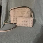 Michael Kors Light Pink Laser Cut Crossbody Bag with Wristlet, Gold Hardware